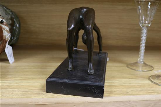 A bronze figure of an acrobat, signed Milo length 25cm